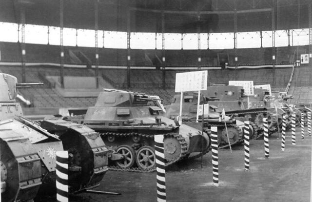A Nationalist Renault FT, two Panzer Is (armed with Soviet machine guns), two T-26s (missing their armaments and mantlets), and just in shot, a Vickers Mark E Type B on display in Hanshin Koshien Stadium in Nishinomiya, Japan, February 1939.
