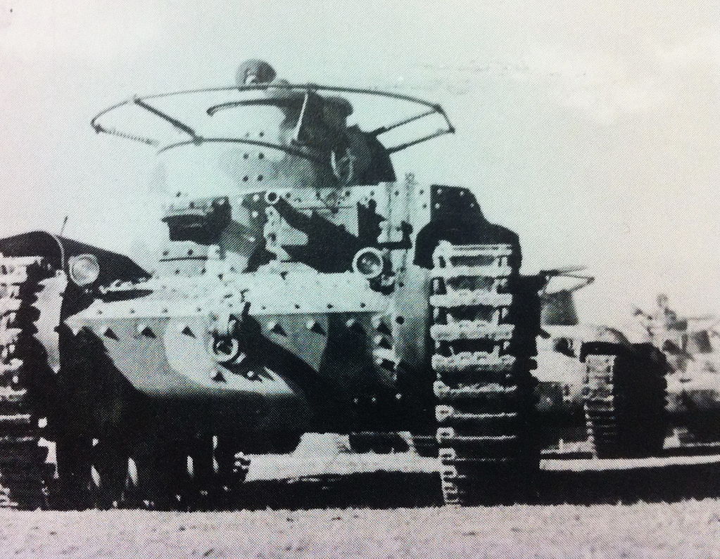A Shi-Ki leading a column of Chi-Ha tanks. Note the 37 mm gun in the hull and how large the horseshoe antenna was.