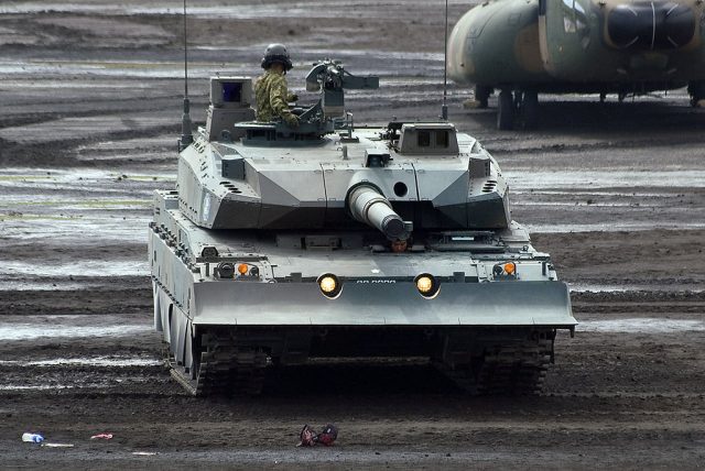 The Type 10 with dozer blade attached. Note the cut-outs in the middle of the blade for the tank's headlights - Photo: Global Military Review