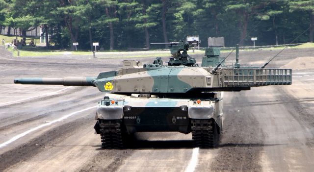 The Type 10 with its turret traversed to the right. Note the length of it with the rack included.