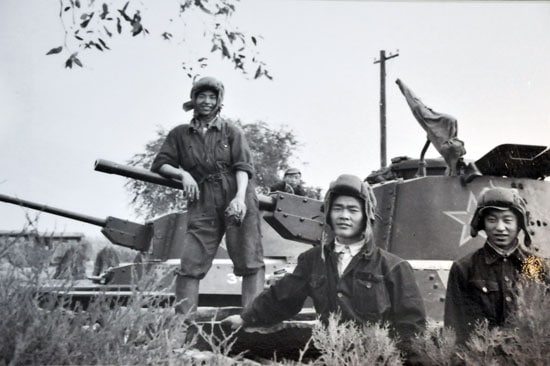 Two PLA Chi-Ha Shinhotos and their crews, presumably during downtime