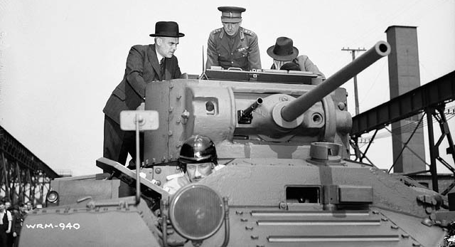 Defense minister C.D. Howe inspecting the first Valentine VI, coming right out from the Montreal factory, at the Canadian Ministry of Munitions and Supply, in May 1941