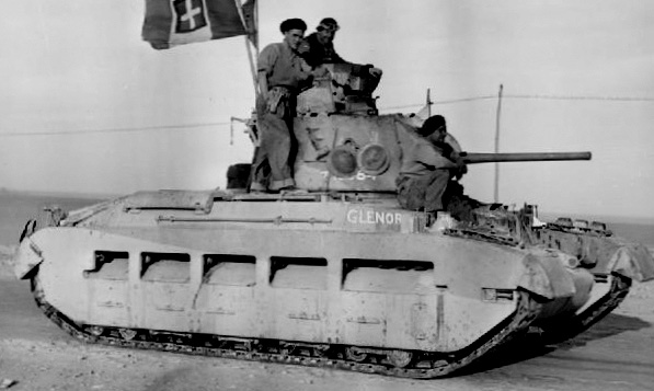 Matilda tank on its way into Tobruk, displaying an Italian flag, 24 January 1941, during Operation Compass.