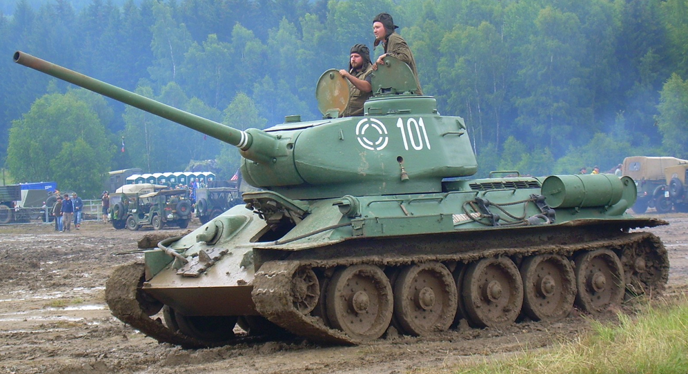 A T-34-85 running at an exposition, possibly in the Czech Republic